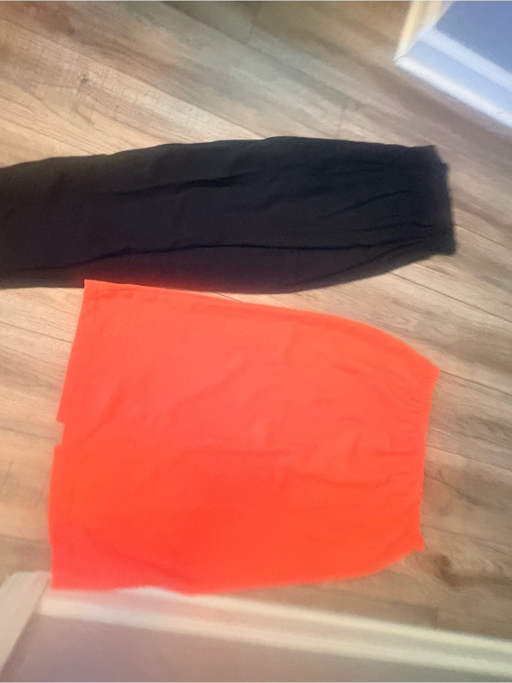 Women’s Orange Skirt & Black Pants
